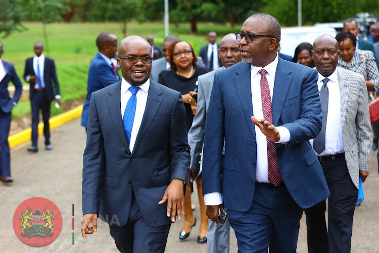 TRAINING OF TRAINERS: Interior PS Raymond Omollo and Agriculture CS Mithika Linturi during training of assistant county commissioners and county directors of agriculture ahead of national household farmer registration at Kenya School of Government in Kabete, Nairobi on Wednesday, January 4.