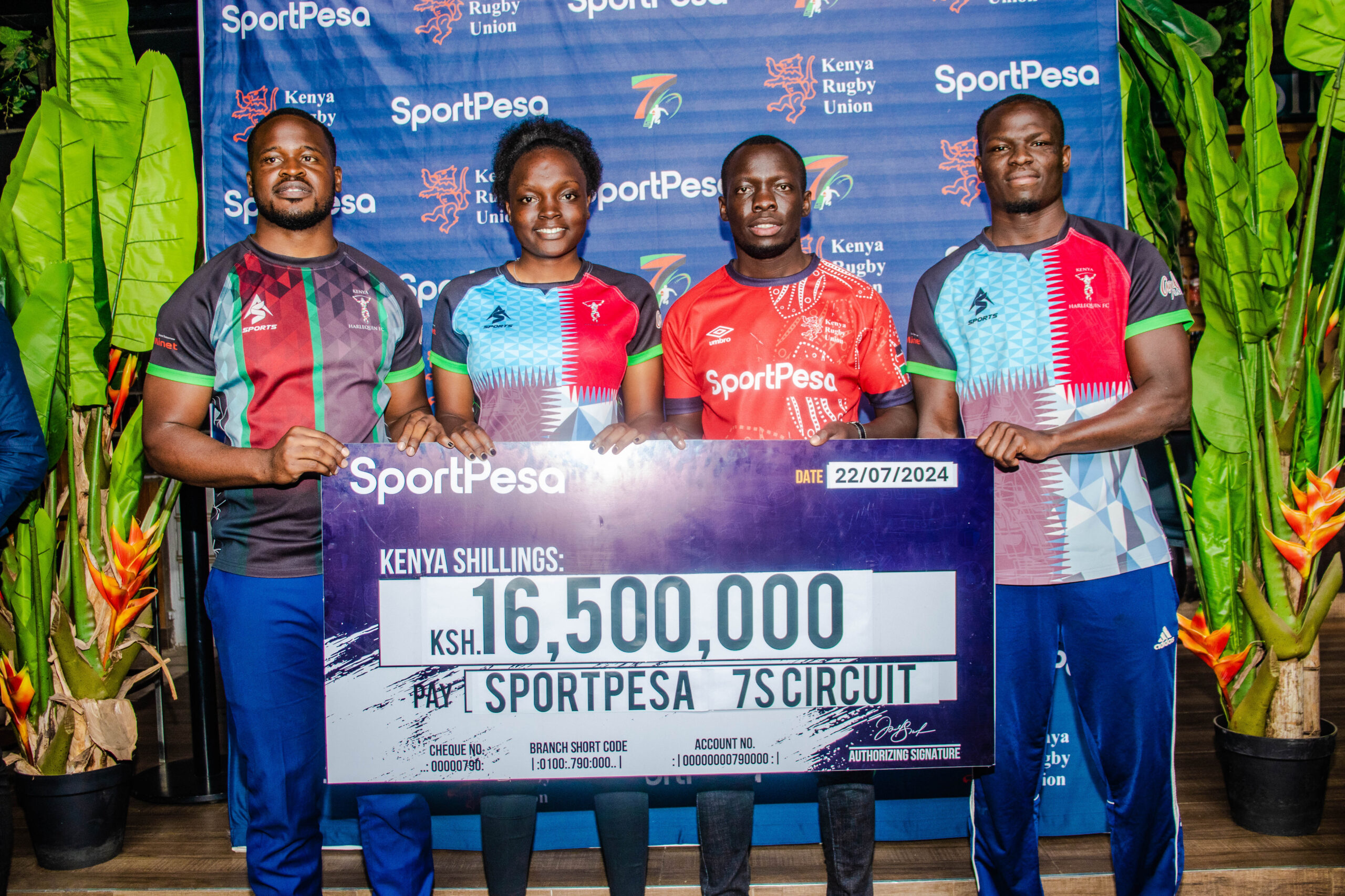 From Left - Kenya Harlequins Players, Wiseman Aganya, Sandra Oduor and Jan Remke with SportPesa's Willis Ojwang 2nd Left