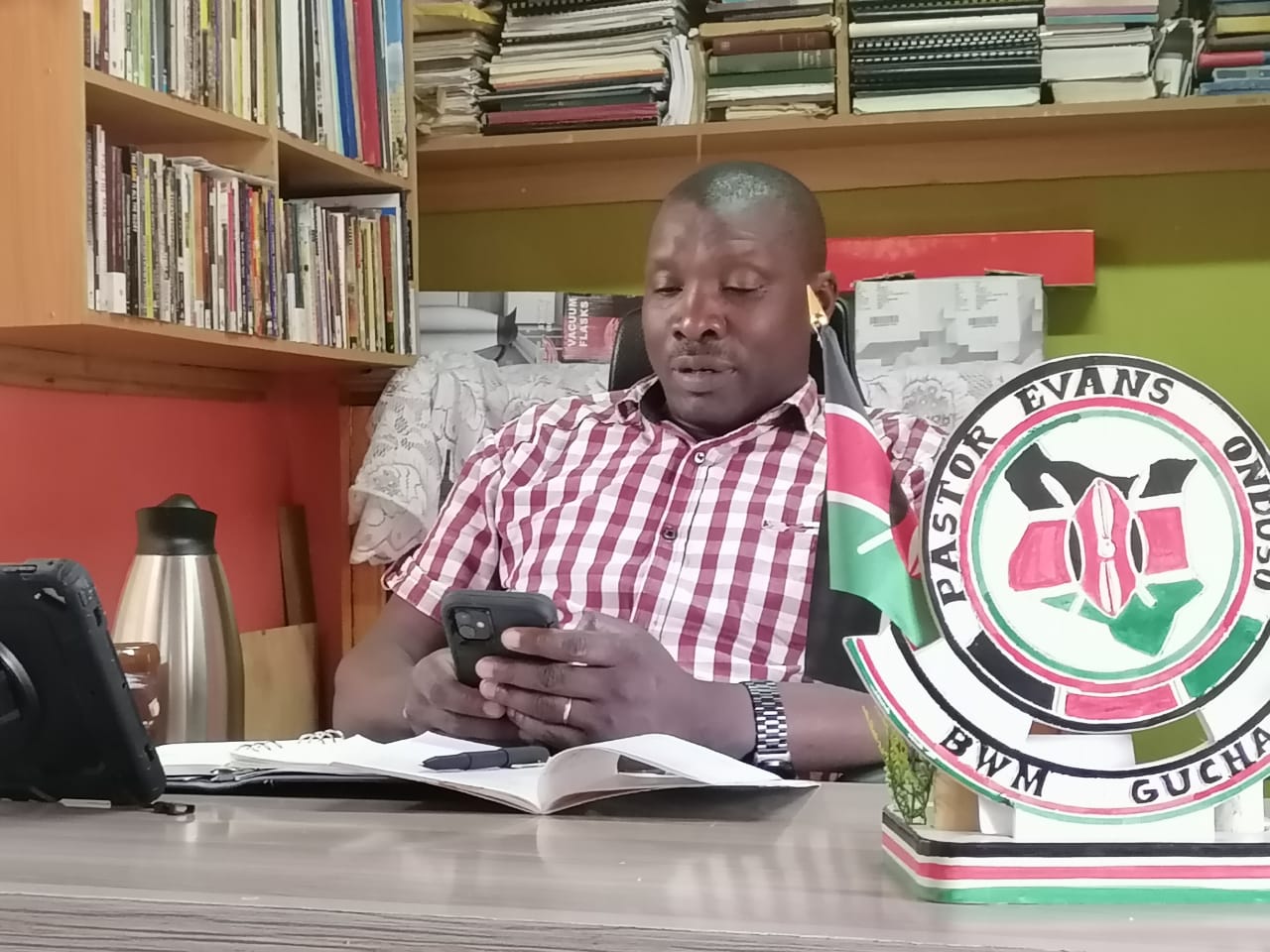Pastor Evans Onduso in his office Thursday (Photo by Mahatma Gadhi Magati)